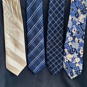 4 men’s ties. 3 blue patterns and 1 off white satin stripes.